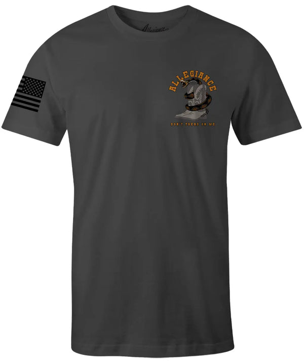 Front of Western Premium Tee in dark charcoal with small rattlesnake and cowboy boots chest graphic and flag on sleeve